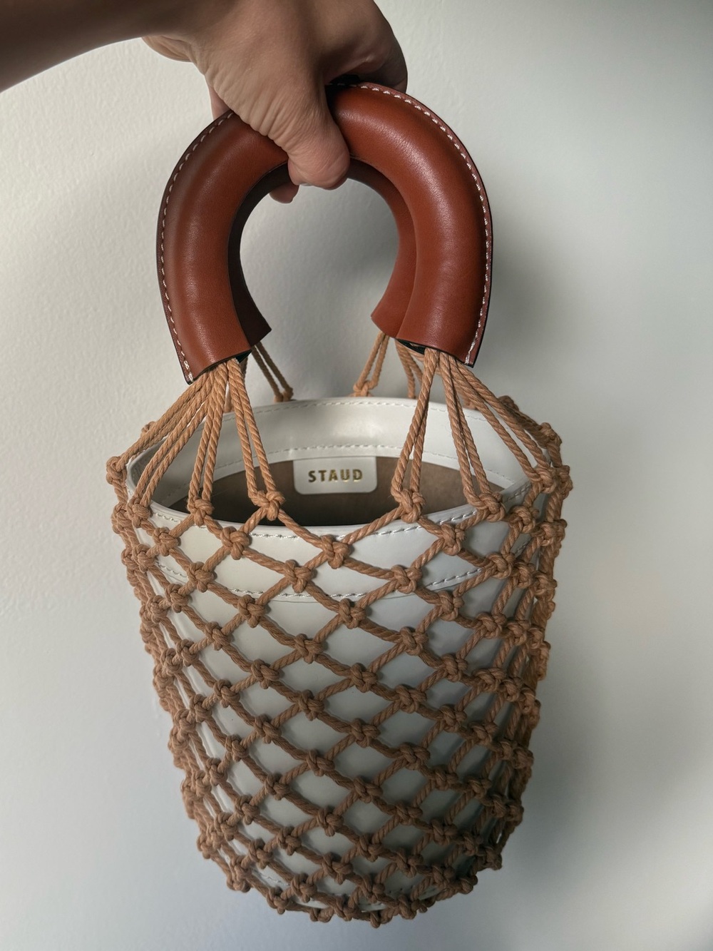 STAUD White Bucket Bag with Brown Leather Handles and Tan Macrame Netting